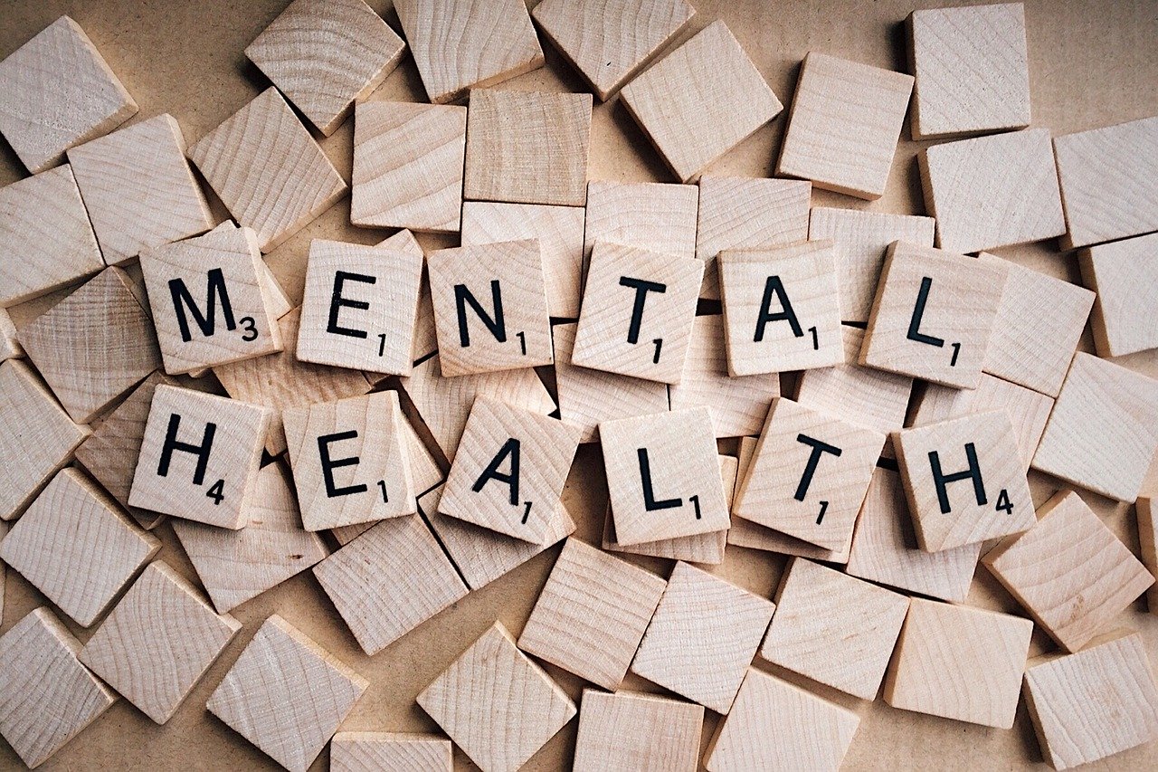 scrablle letters spelling the words "Mental Health"