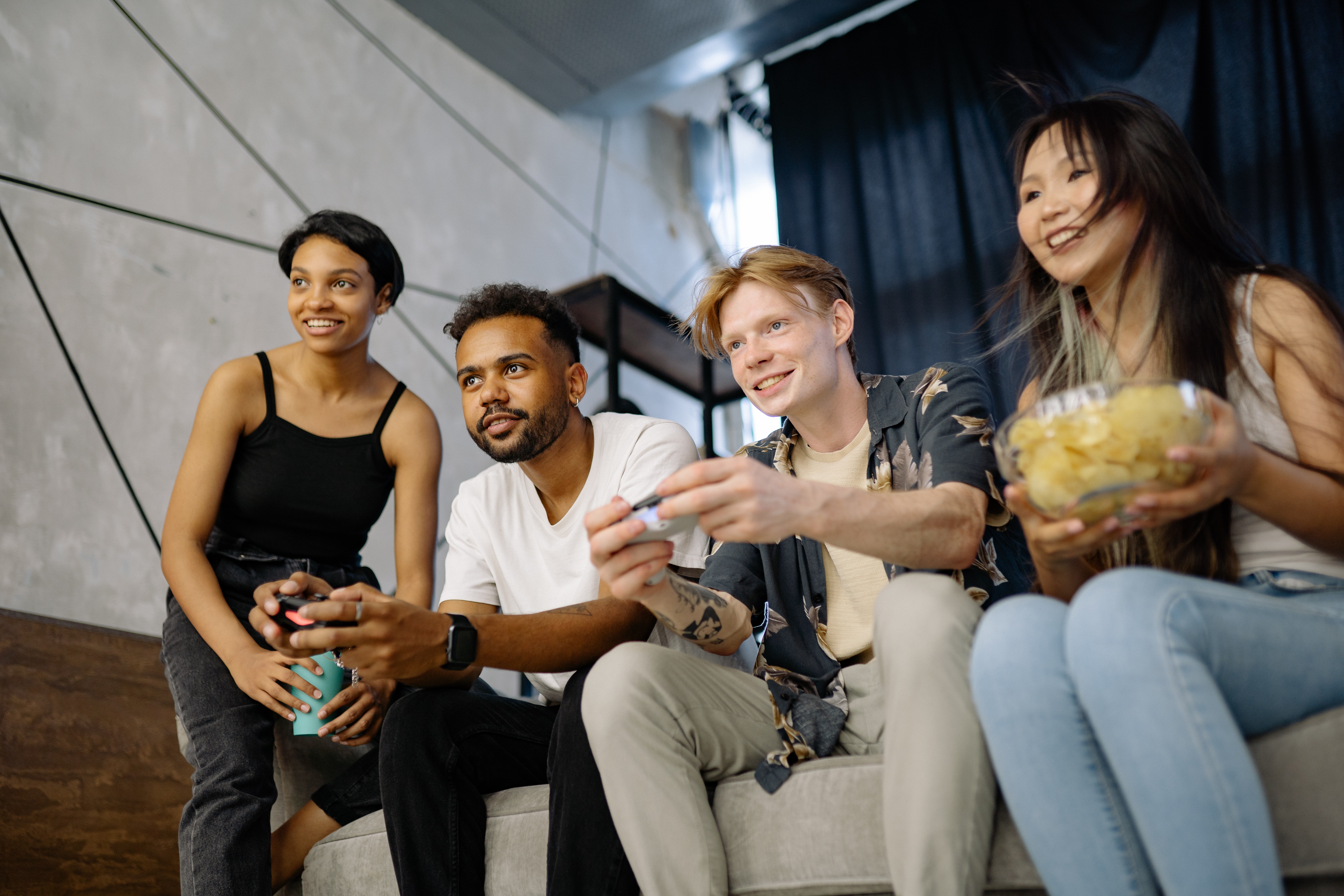 Teens playing video games