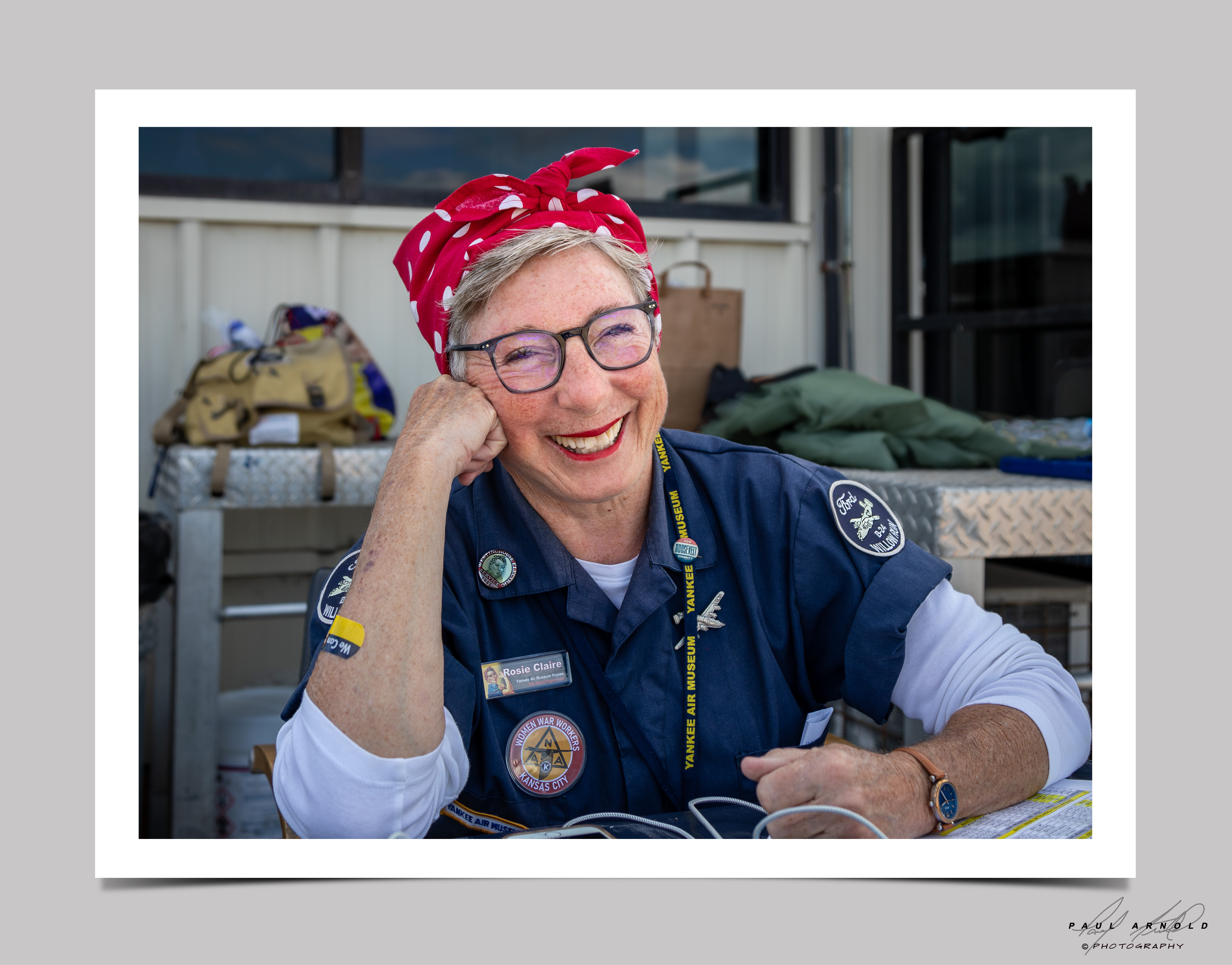 Photo of presenter Claire Dahl, dressed as Rosie the Riveter 