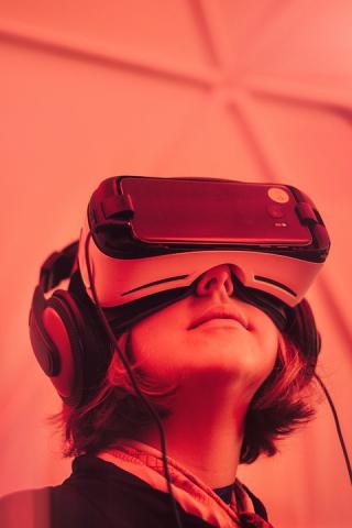 child with VR goggles