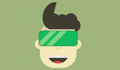 Tween with virtual reality goggles on his face.