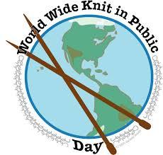 World Wide Knit in Public logo (earth image crossed by wooden knitting needles)