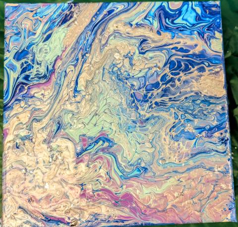 Pour painted canvas in silver, blue, aqua and purple with bits of silver foil sprinkled in.