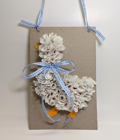 Goose wall hanging craft using tissue and orange dry clay and gingham ribbon