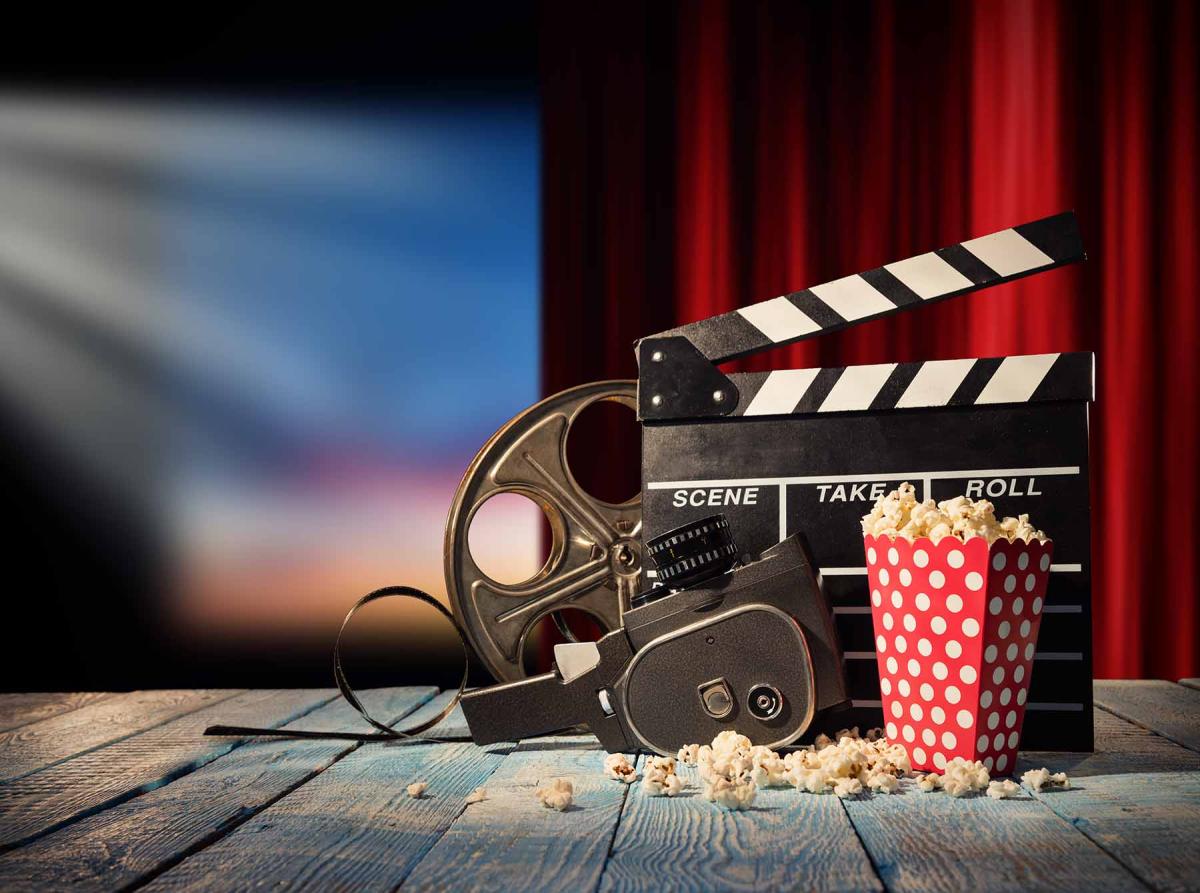 Photo of movie projector and screen.