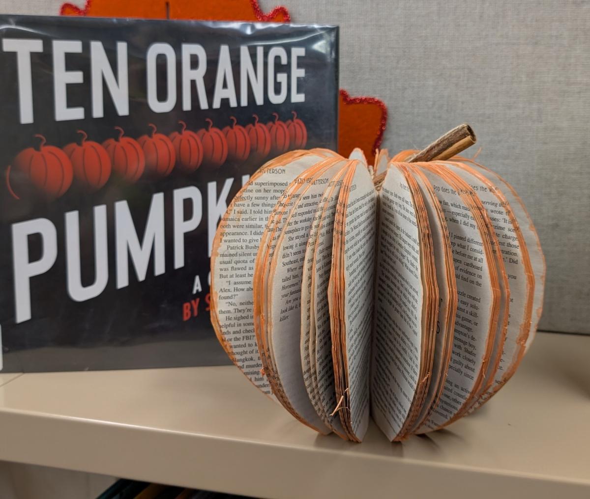 decorative pumpkin made from a book