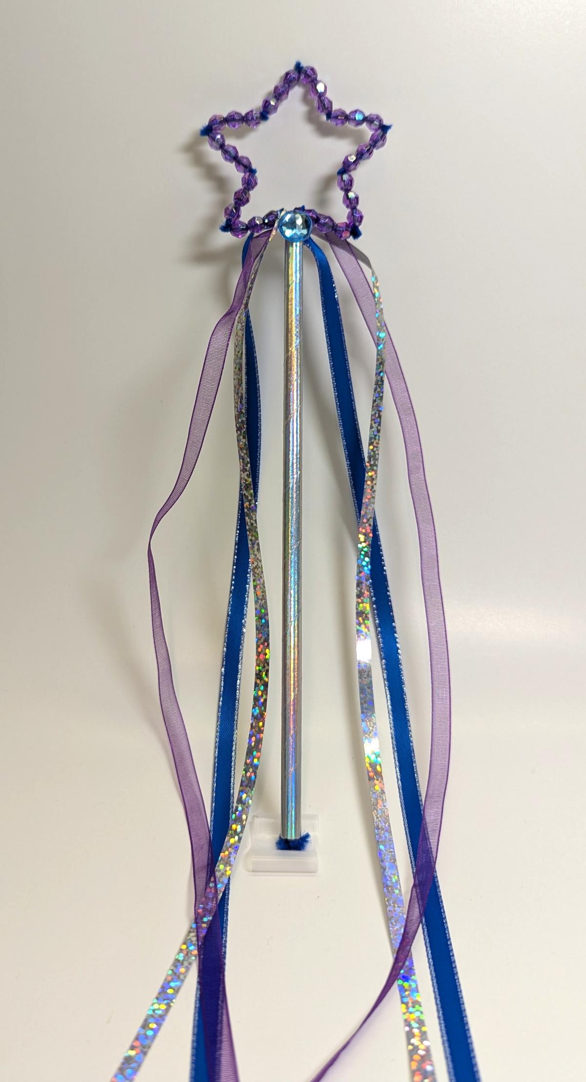 star wand made from drinking straw, beads and ribbon.
