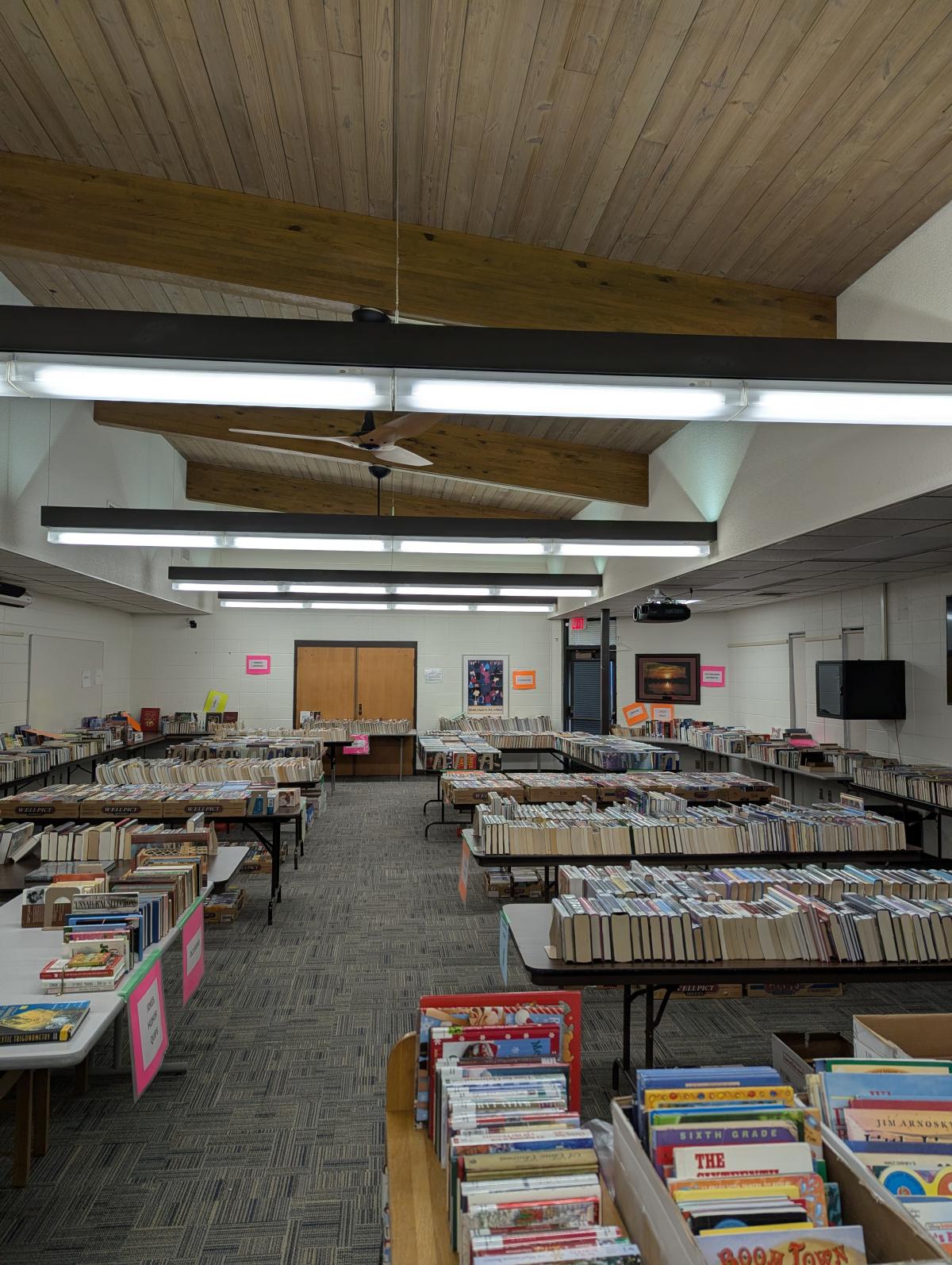 photo of books arranged on tables in the Butman-Fish Library meeting room